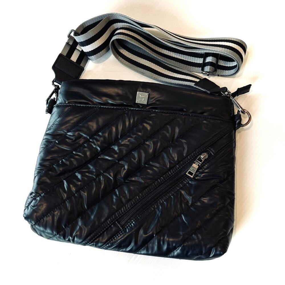 Think Royln Westwood black crossbody bag wide striped strap pink lining